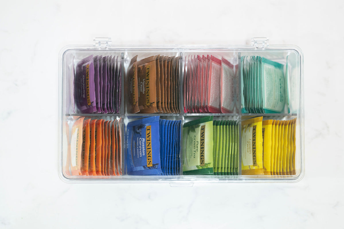 Multi-Use Storage Box with Dividers organising tea bags; ideal for pantry organisation and kitchen storage.