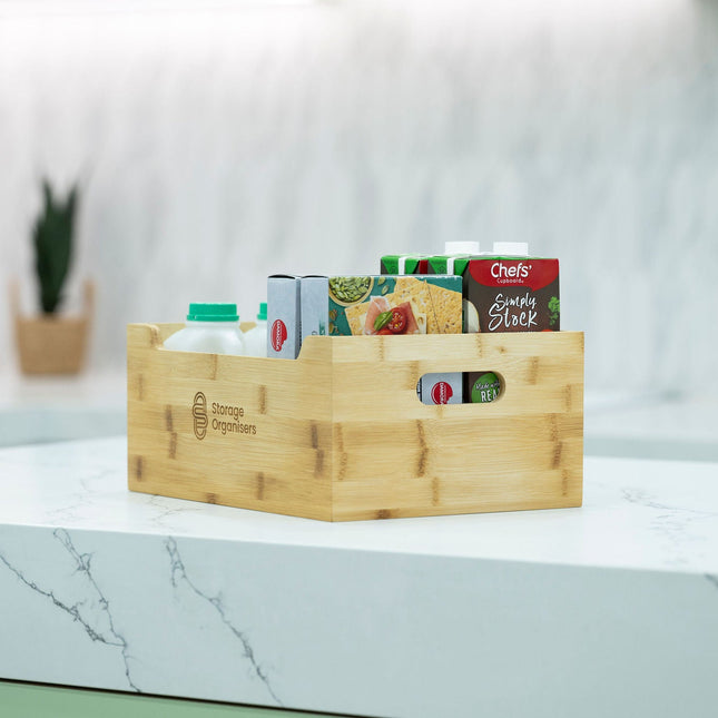 Bamboo Storage Tub – Large on a kitchen countertop, used for pantry organisation, holding various cartons and packs for efficient storage.