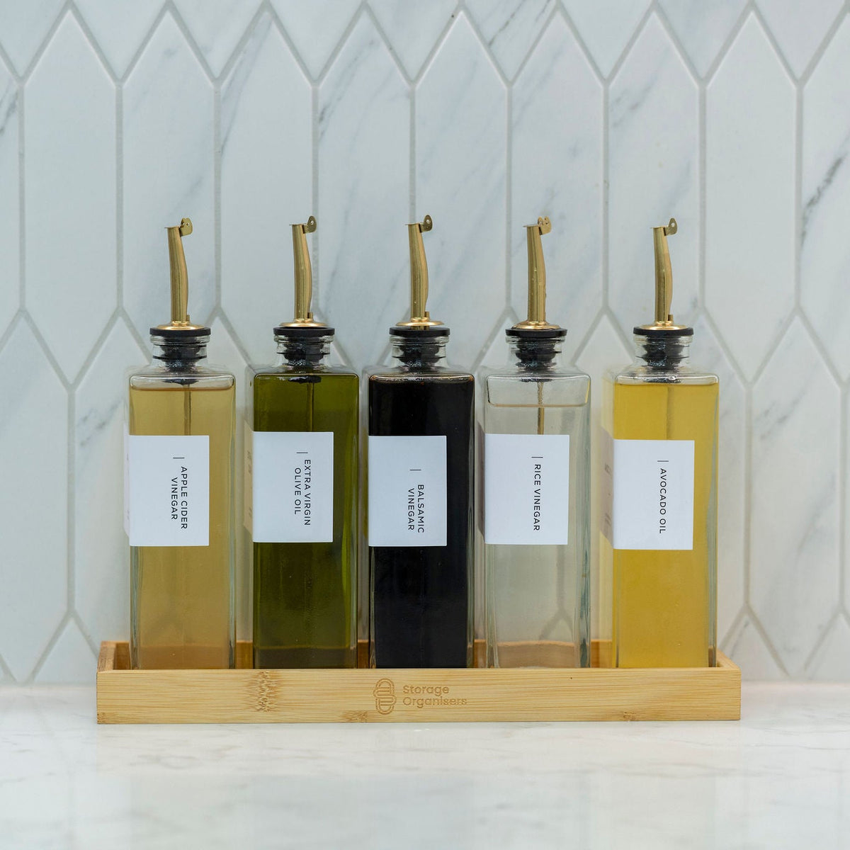 Five Oil & Vinegar Book Bottles with Bamboo Tray, ideal for kitchen organisation and pantry storage, enhancing space efficiency.