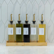 Five Oil & Vinegar Book Bottles with Bamboo Tray, ideal for kitchen organisation and pantry storage, enhancing space efficiency.