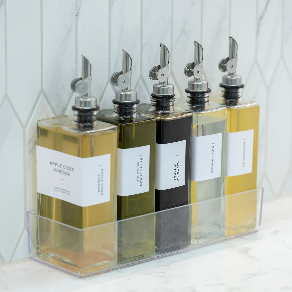 Glass Oil & Vinegar Book Bottle – 350ml Dispenser for kitchen organisation showcasing storage organisers in a modern pantry setting.