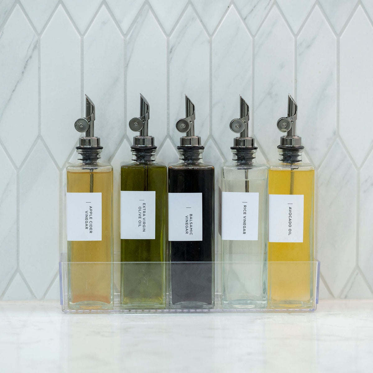 Glass Oil & Vinegar Book Bottle – 350ml Dispenser displayed on kitchen counter for pantry organisation