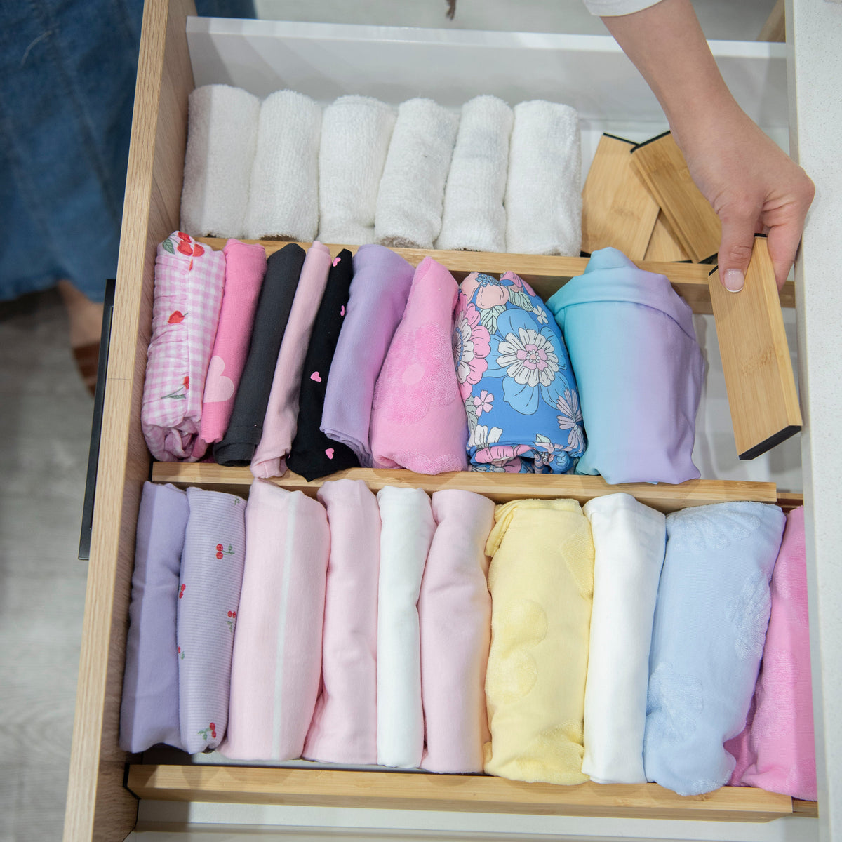 Neatly folded clothes organised with a drawer divider, featuring the New Home Set Up Pack for efficient drawer organisers. Bathroom & Laundry Cupboard Organisation: Make Everyday Routines Easier