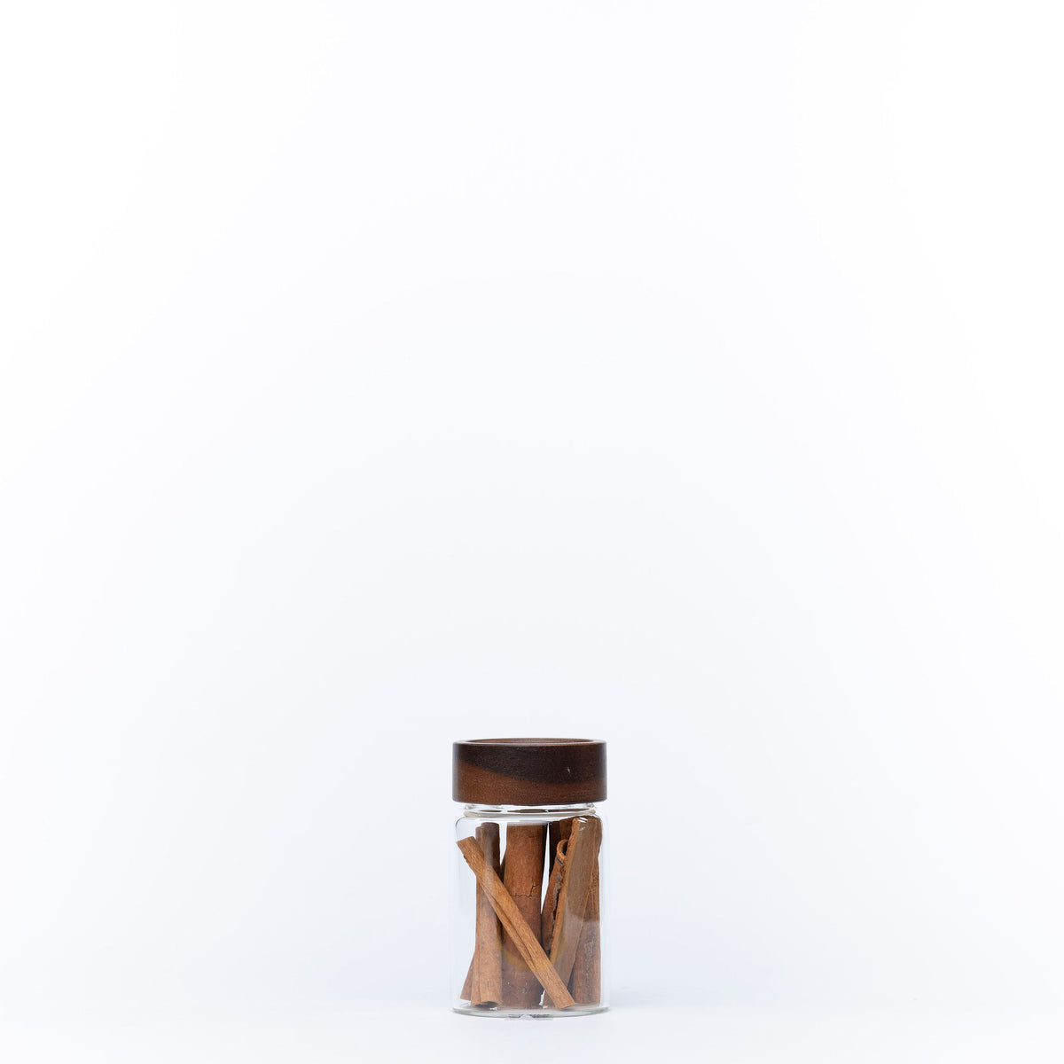 Acacia Screw On Spice Jar – 2 Sizes filled with cinnamon sticks for kitchen or pantry organisation, enhancing drawer organisers.