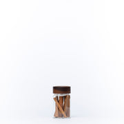 Acacia Screw On Spice Jar – 2 Sizes filled with cinnamon sticks for kitchen or pantry organisation, enhancing drawer organisers.