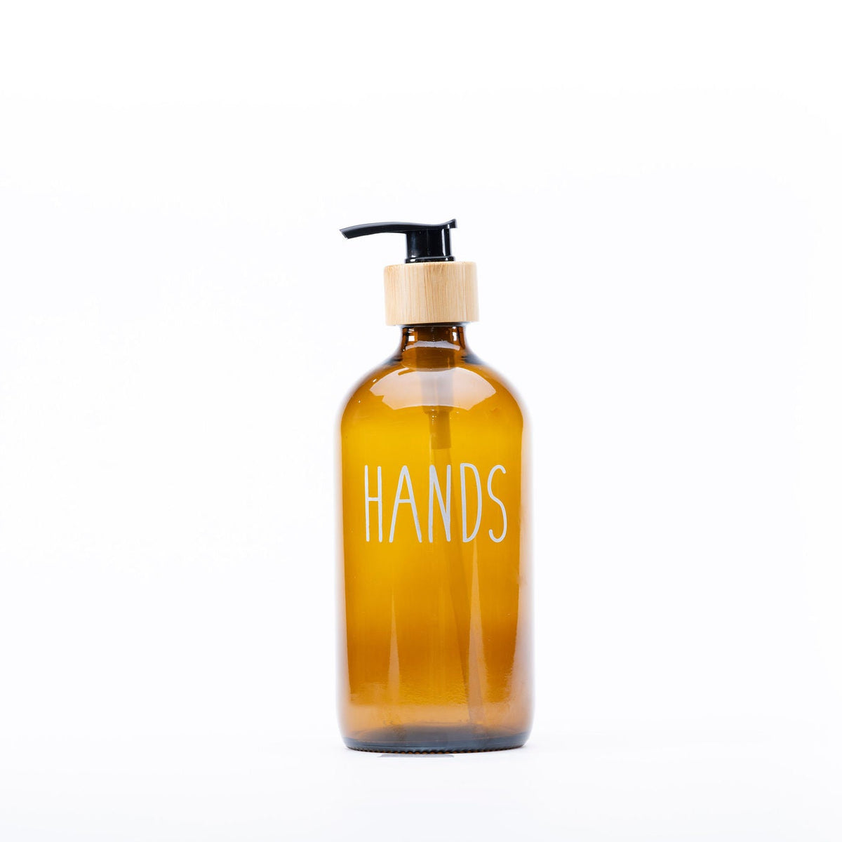 Brown Glass Pump Bottle – 500 ml Refillable Dispenser ideal for kitchen and pantry organisation, enhancing storage efficiency.