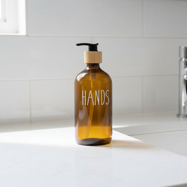 Brown Glass Pump Bottle – 500 ml Refillable Dispenser for kitchen or bathroom use, ideal for enhancing pantry organisation.