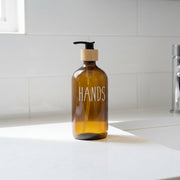 Brown Glass Pump Bottle – 500 ml Refillable Dispenser for kitchen or bathroom use, ideal for enhancing pantry organisation.