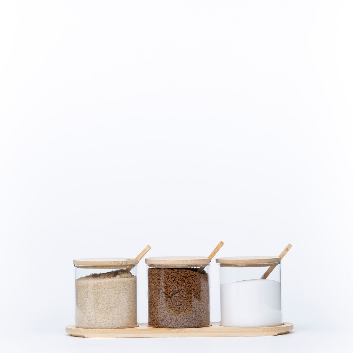 Round Bamboo Trio Glass Jar Set – 300ml Each for kitchen pantry organisation, used to store dry goods with bamboo lids and spoons.