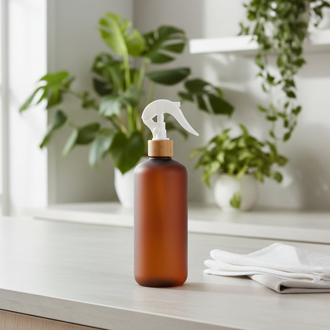 Amber Frost Spray Bottle – 500 ml Refillable Cleaner on a kitchen counter, ideal for kitchen organisation and storage.