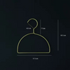 Gold hijab scarf hanger with semicircle design, perfect for organizing wardrobe. Space-saving and elegant metal finish.