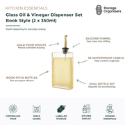 Book-style glass oil and vinegar dispenser set featuring two 350ml bottles with gold pour spouts, waterproof labels, and refill funnel. Space-saving kitchen storage solution for oils, vinegars, dressings, and everyday cooking essentials.